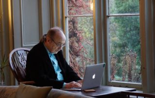 Older man using a laptop