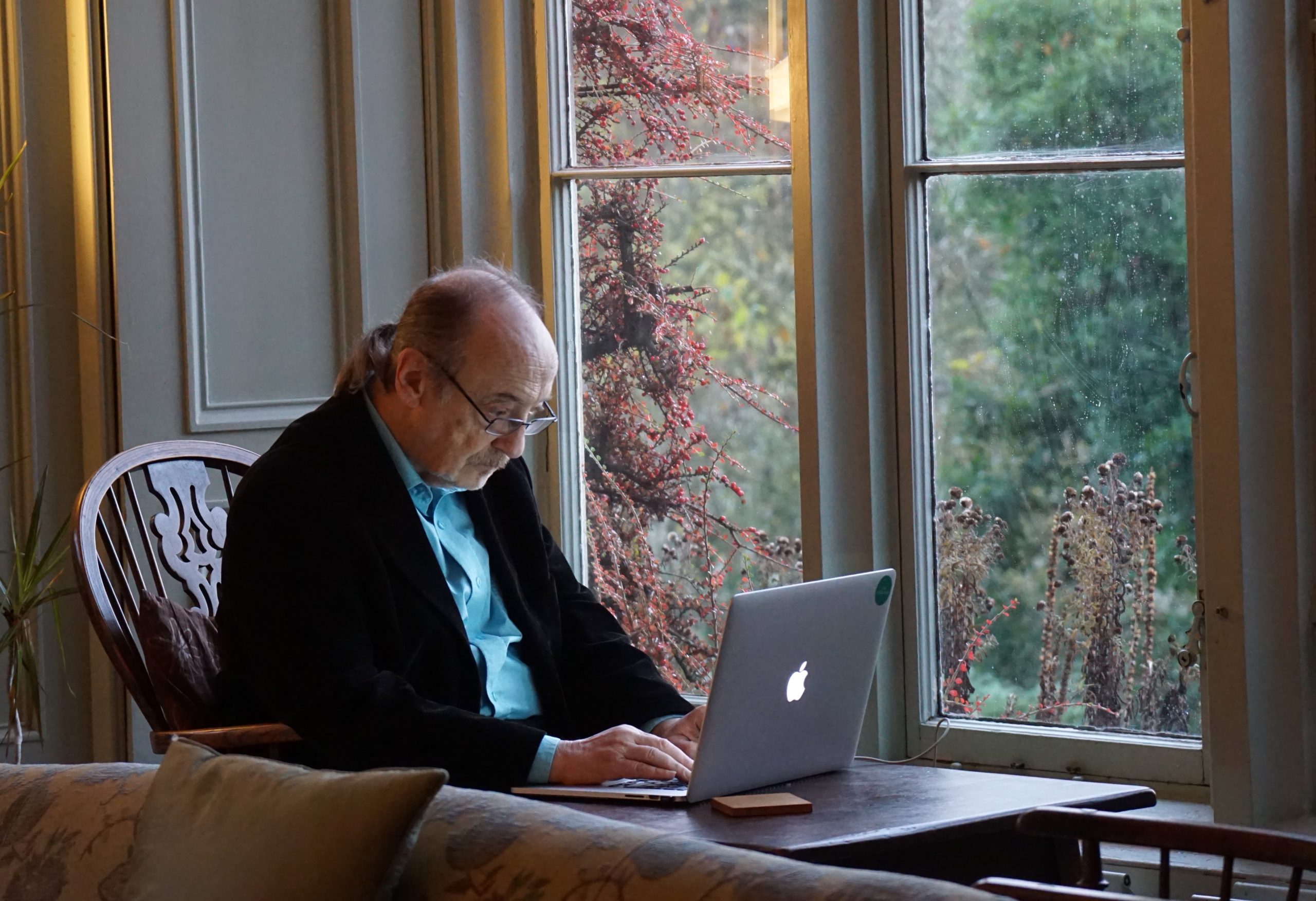 Older man using a laptop